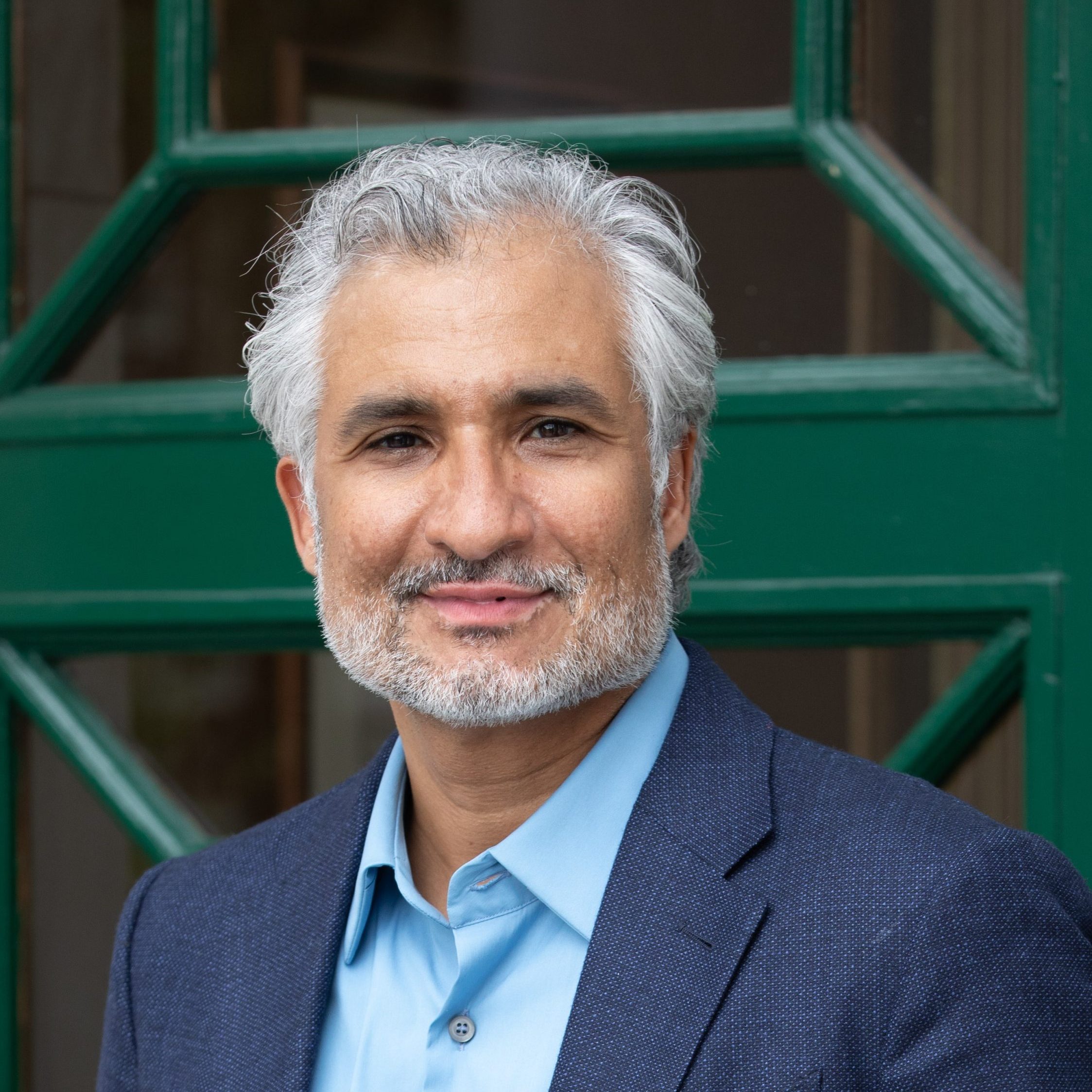 Reza Headshot 2022 Reza Headshot 2022